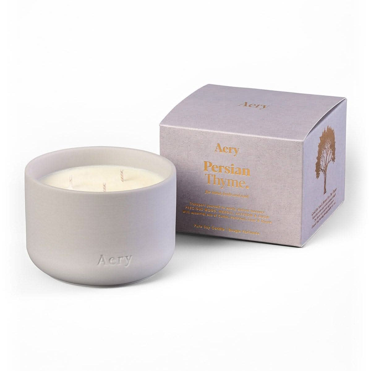 Aery clay pot triple wick persian thyme candle with packaging on a white background