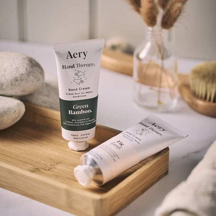 Aery Green Bamboo hand cream and packaging on a white background