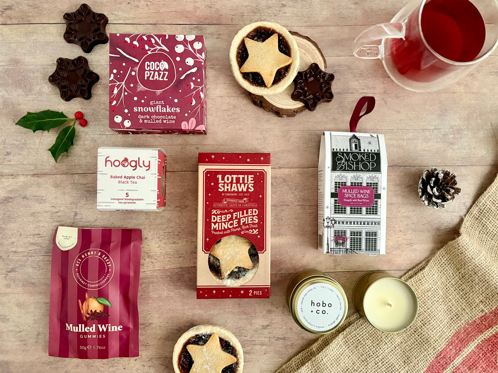 VEGAN Winter Festive Gift package with mince pies, mulled wine spice bags, baked apple chai tea, dark choc with mulled wine, orange spice candle, honeycomb truffles