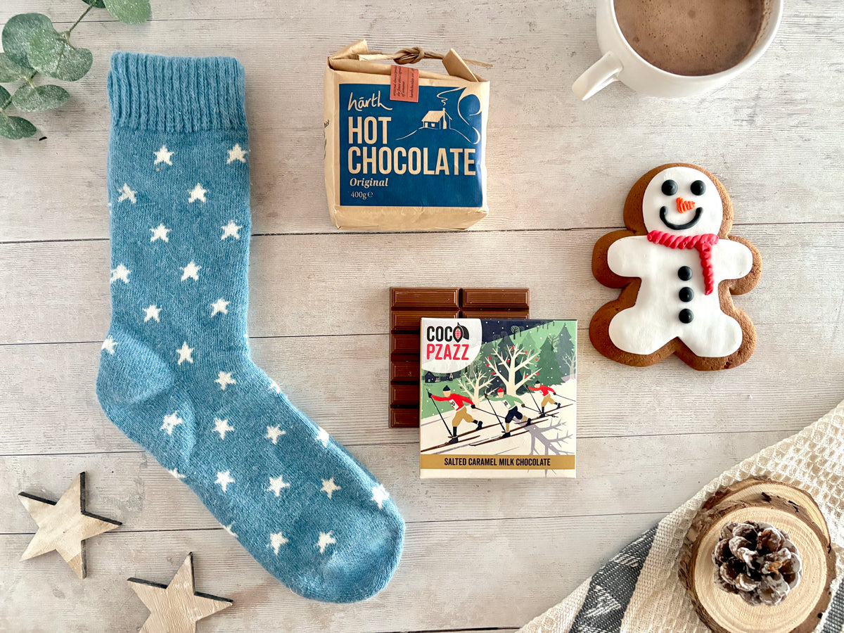Winter Frosty Nights Gift Package with Blue Star cosy socks, hot chocolate, snowman ginger biscuit and milk chocolate bar