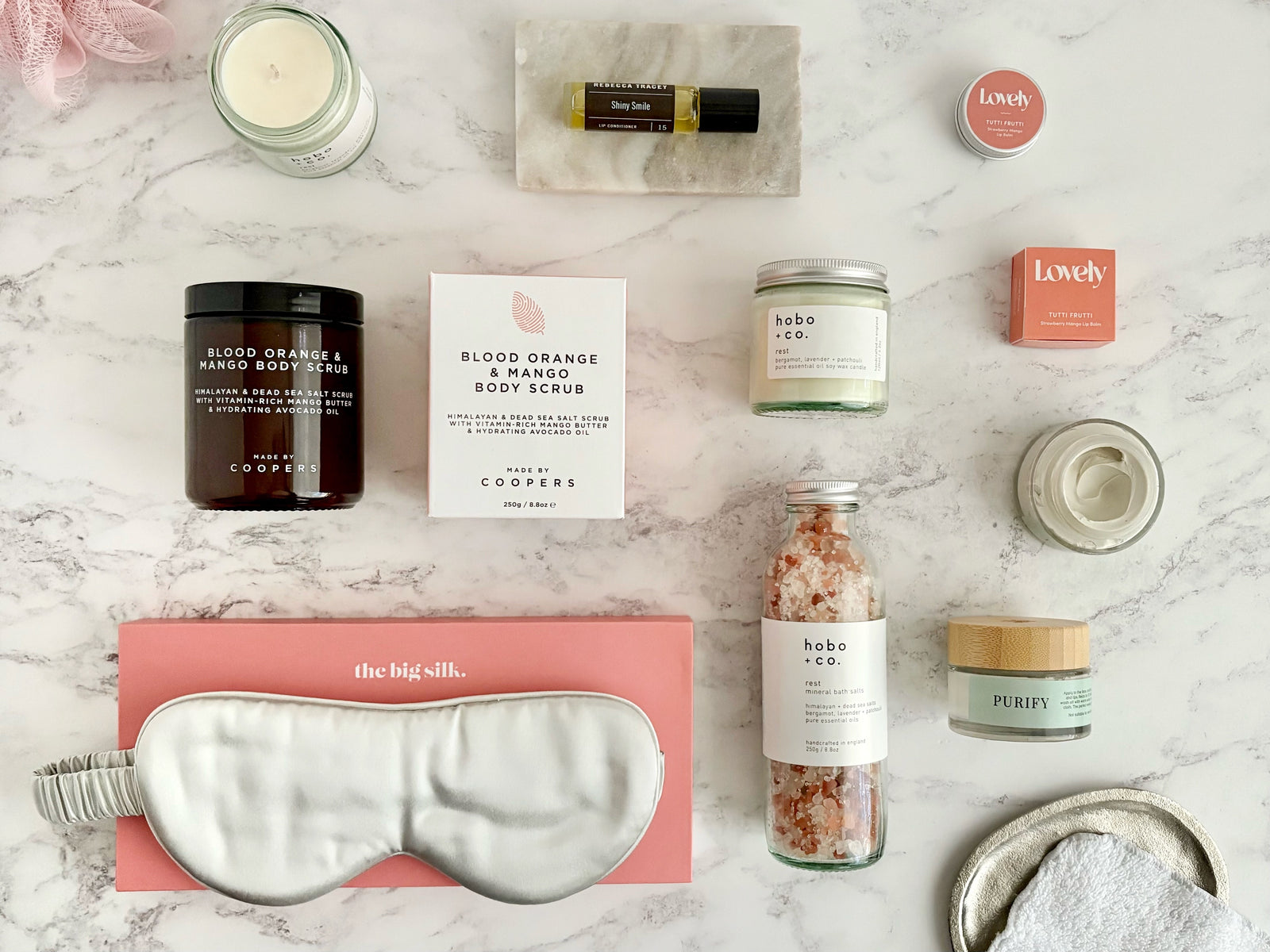 Glow Up Luxury Pamper Gift Hamper Package with silk eye mask, body scrub, bath salts, face mask, candle, lip balm, sleep pulse point roll on