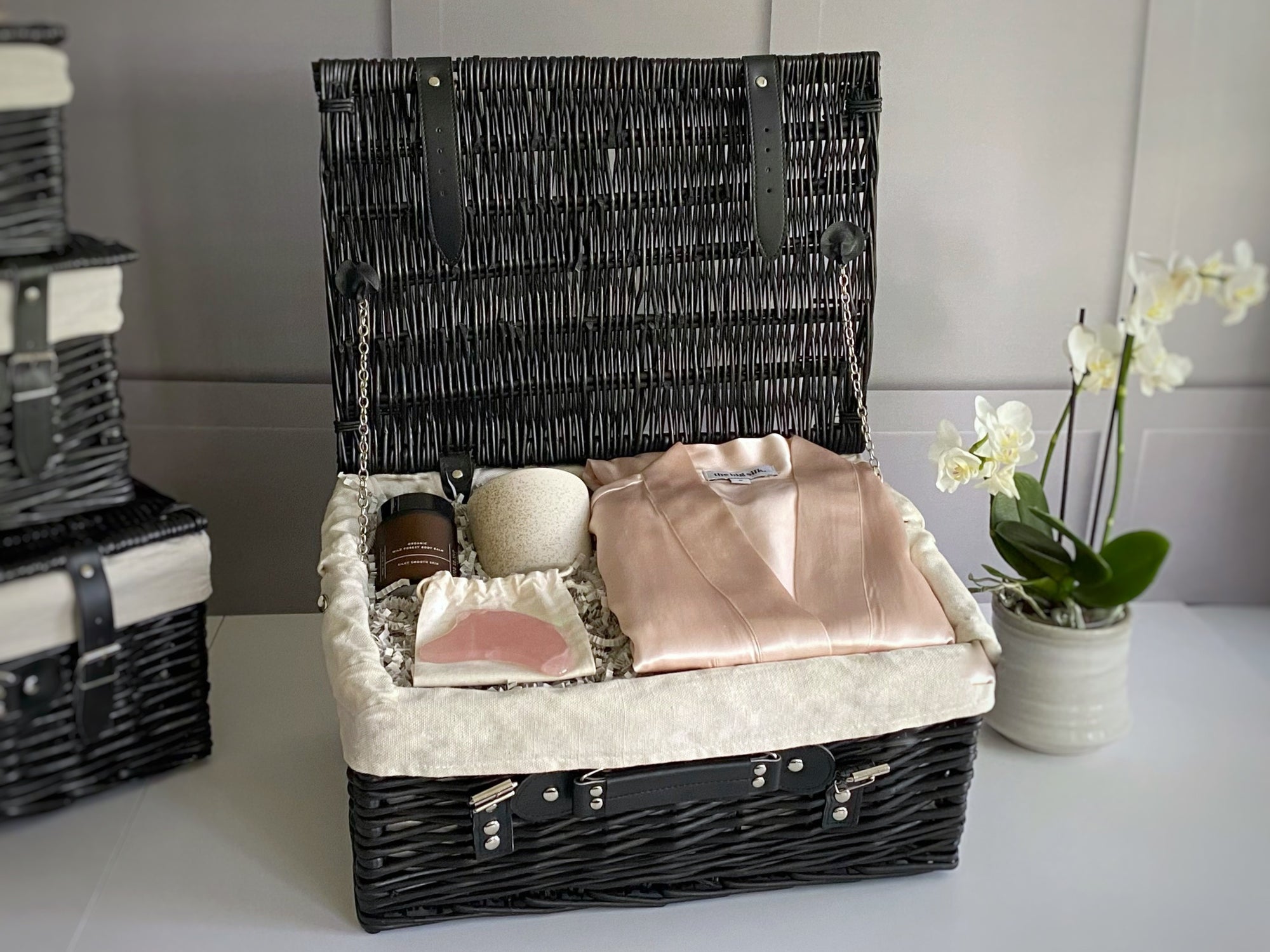 Premium luxury pamper hamper basket with silk robe gown rose quartz gua sha body balm and candle